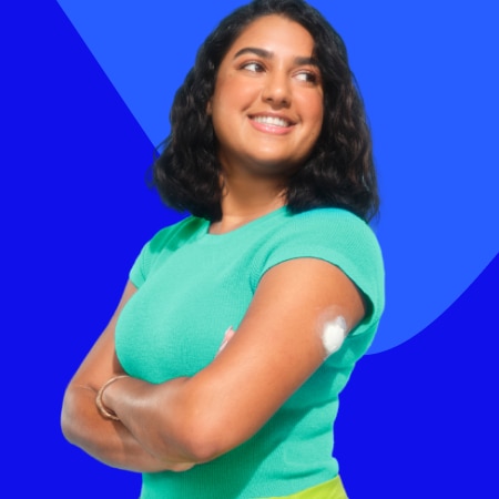woman smiling with insulin pump on hip